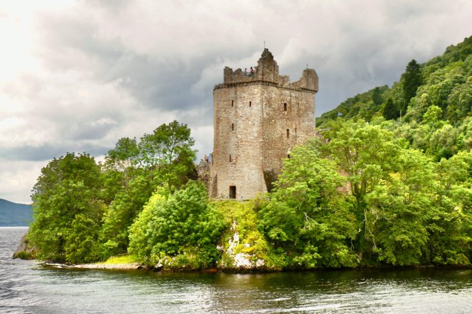 Stone tower of Urquhart Castle on the shores of Loch Ness